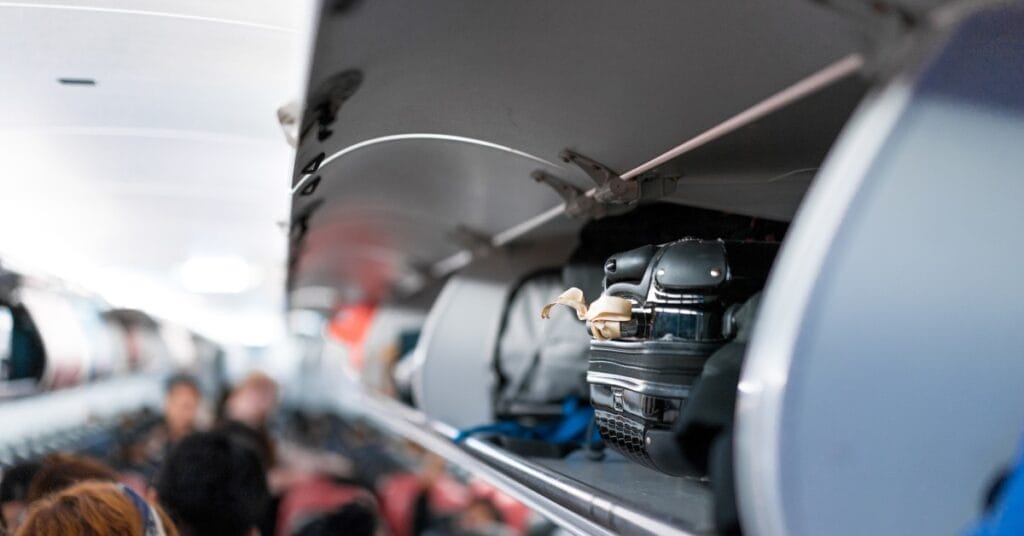 Overhead baggage compartment on an airplane.